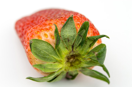 Strawberry with leaves isolated on white backgroundの写真素材