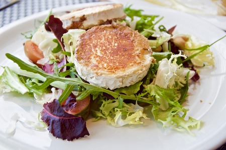 Goat cheese salad ready to eat in macro viewの写真素材