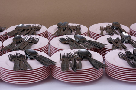 Clean dishes, forks and spoons