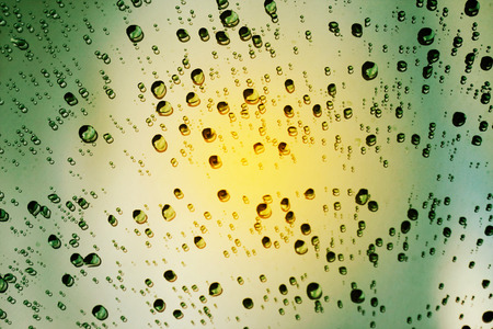 water drops on glass, abstract background, vintage styleの写真素材