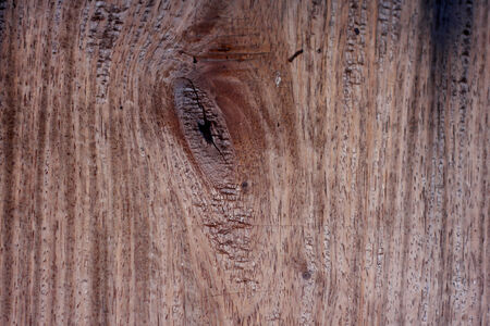 Old wooden surface with gnarl in brown toneの写真素材