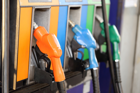 Pump nozzles at the gas station.の写真素材