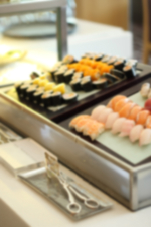 Blurred image of sushi bar at restaurant.の写真素材