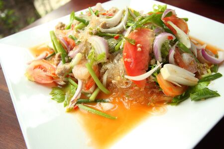 Thai spicy vermicelli and seafood salad.の写真素材