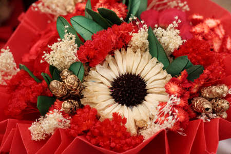 Close up of colorful artificial flowers bouquet.の写真素材