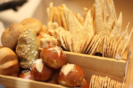 Several kinds of breads in basket.