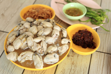 Set of fresh oysters with chilli paste, Thai style seafood recipe.の写真素材