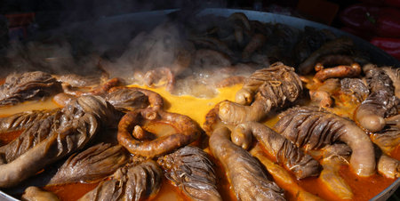 Turkish Offal Dish Shirdan Being Cooked. Steaming Shirdan, a Traditional Turkish Tripe Meal. Local Delicacy in Turkeyの写真素材