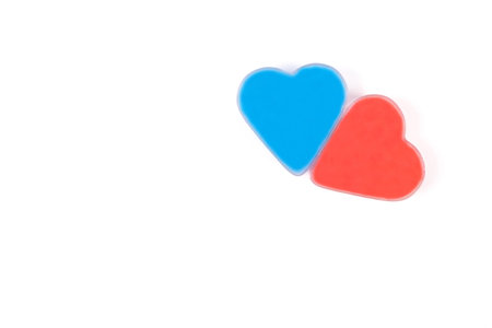 Red and blue hearts isolated on white background. Valentine's day, relationships and love concept, Top view, close upの写真素材