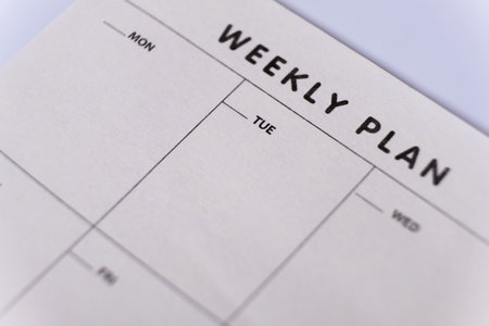 Weekly planner. Calendar reminder, organizer, schedule, planning concept. Close-up of weekly plan paperの写真素材