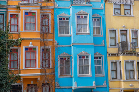 Colorful historic houses with ornate windows in Balat, Istanbul. Touristic district, attractions with historical sites. Colorful streets in Balat. Local and foreign tourists love this placeの写真素材