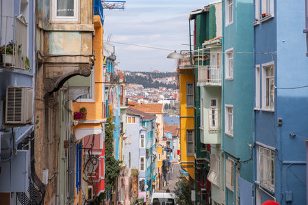 Colorful historic houses with ornate windows in Balat, Istanbul. Touristic district, attractions with historical sites. Colorful streets in Balat. Local and foreign tourists love this placeの写真素材