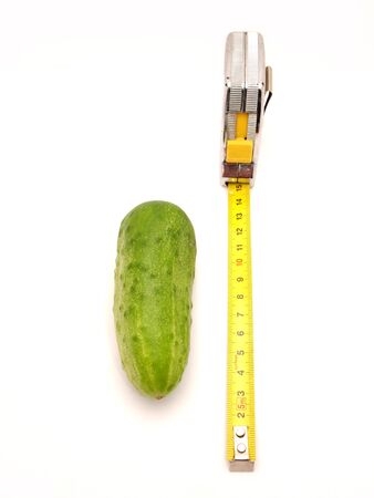 Cucumber and roulette on a white background    の写真素材