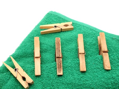 Clothespins on a towel on a white background     の写真素材