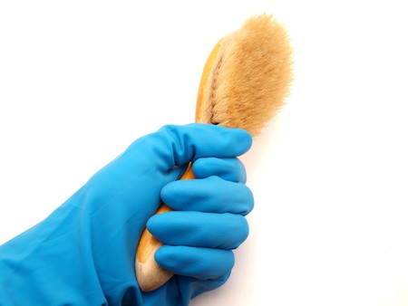 Rubber glove and brush on a white background   の写真素材