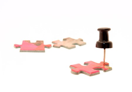 Buttons and puzzle on a white backgroundの写真素材