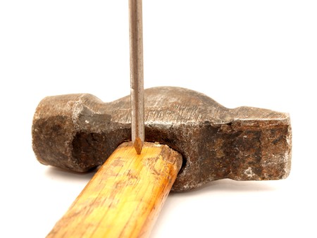 Hammer and nails on a white background    