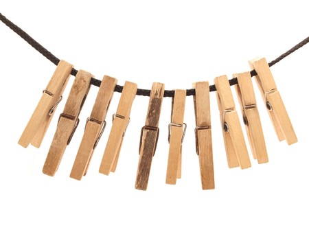 Clothespins and rope on a white background  