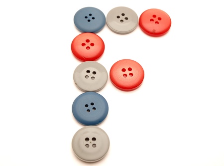 Letters from buttons on a white background      の写真素材