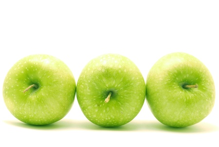 green apple isolated on white の写真素材