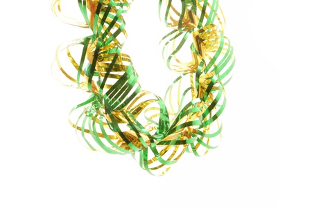 Green Christmas tinsel border, isolated on white. 