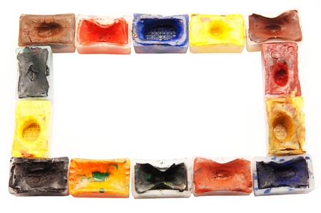 Frame. Color tubes with a paint on a white background の写真素材