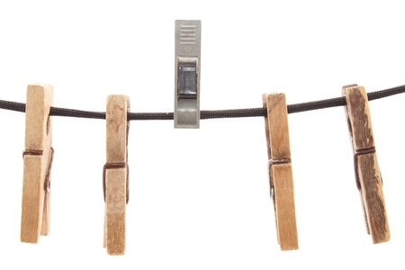 Clothespins and rope on a white background 