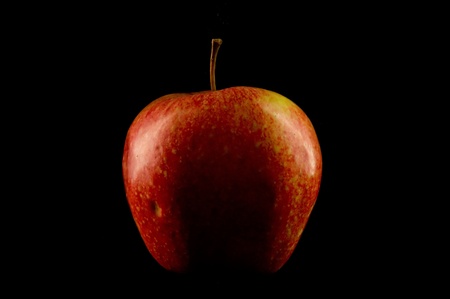 apple on a black background