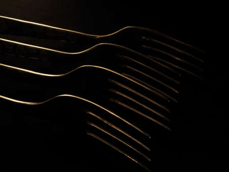 fork on a dark backgroundの写真素材