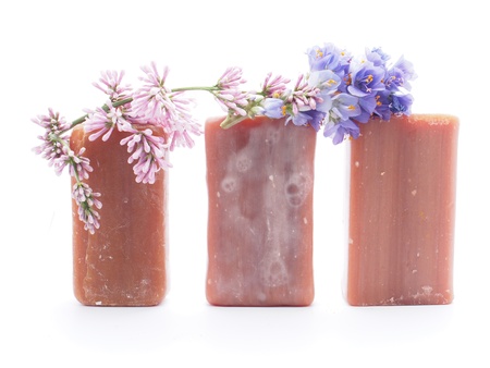 soap and flowers on white backgroundの写真素材