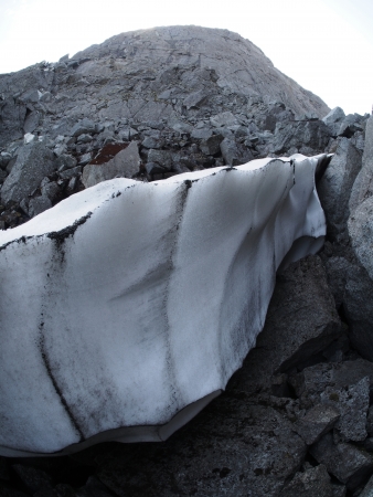 Snow in the mountains in summerの写真素材