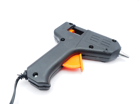 glue gun on a white backgroundの写真素材