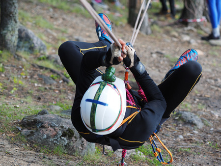 LOSOSINNOE LAKE, KARELIA REGION, RUSSIA - JUNE 29, 2015: Russian youth competition "Survival School" on Lososinnoe lake, Karelia region, Russia.のeditorial素材