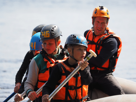 LOSOSINNOE LAKE, KARELIA REGION, RUSSIA - JUNE 29, 2015: Russian youth competition "Survival School" on Lososinnoe lake, Karelia region, Russia.のeditorial素材
