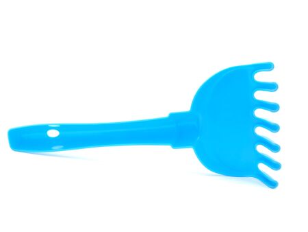 Children rake on a white backgroundの写真素材