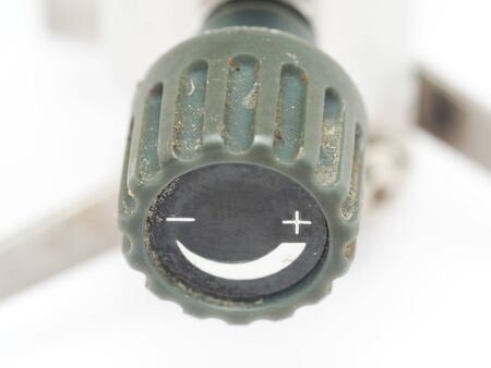 regulating handle plus or minus on a white background