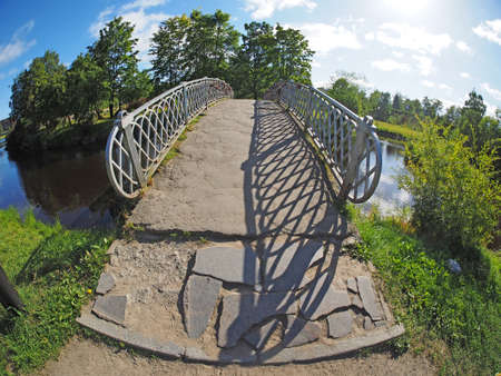 bridge over the river in the park. Russia. Petrozavodskの写真素材
