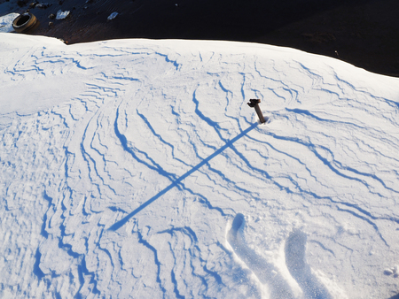 rusty pipe in the snow