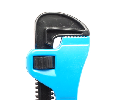 Children's pipe wrench on a white backgroundの写真素材