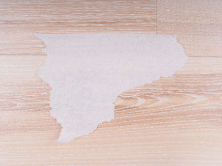 piece of paper on a wooden backgroundの写真素材
