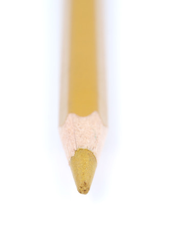 beige pencil on a white backgroundの写真素材
