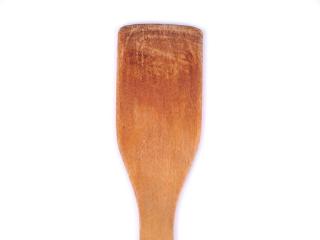 wooden spoon pan on a white backgroundの写真素材