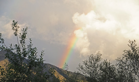 rainbow in the mountainsの写真素材
