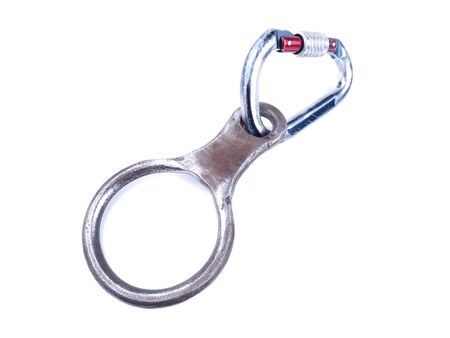 carabiner to the belay device on a white background