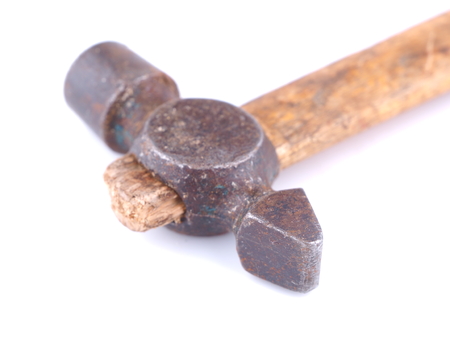 Old hammer with a wooden handle on a white backgroundの写真素材