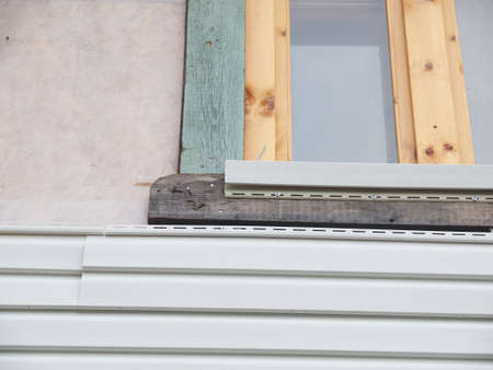 white siding of a frame houseの写真素材