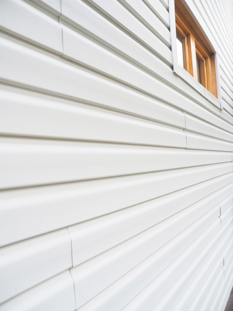 white siding of a frame houseの写真素材