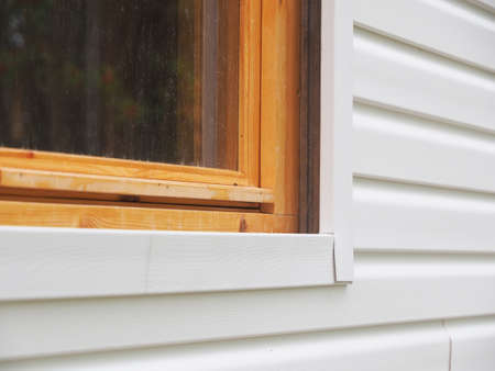 white siding of a frame houseの写真素材