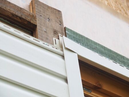 white siding of a frame houseの写真素材