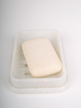 soap in the soap dish on a light backgroundの写真素材